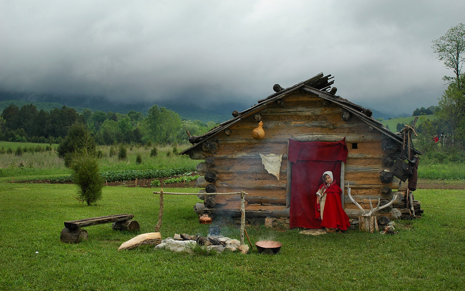Martin's Station log house with reenactment actor portraying woman from the days of Daniel Boone and the early settlement of Southwest Virginia