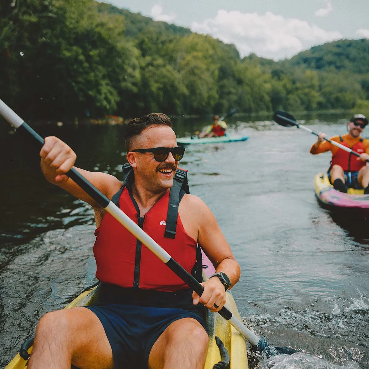 Kayakers paddling on the Clinch River through Southwest Virginia