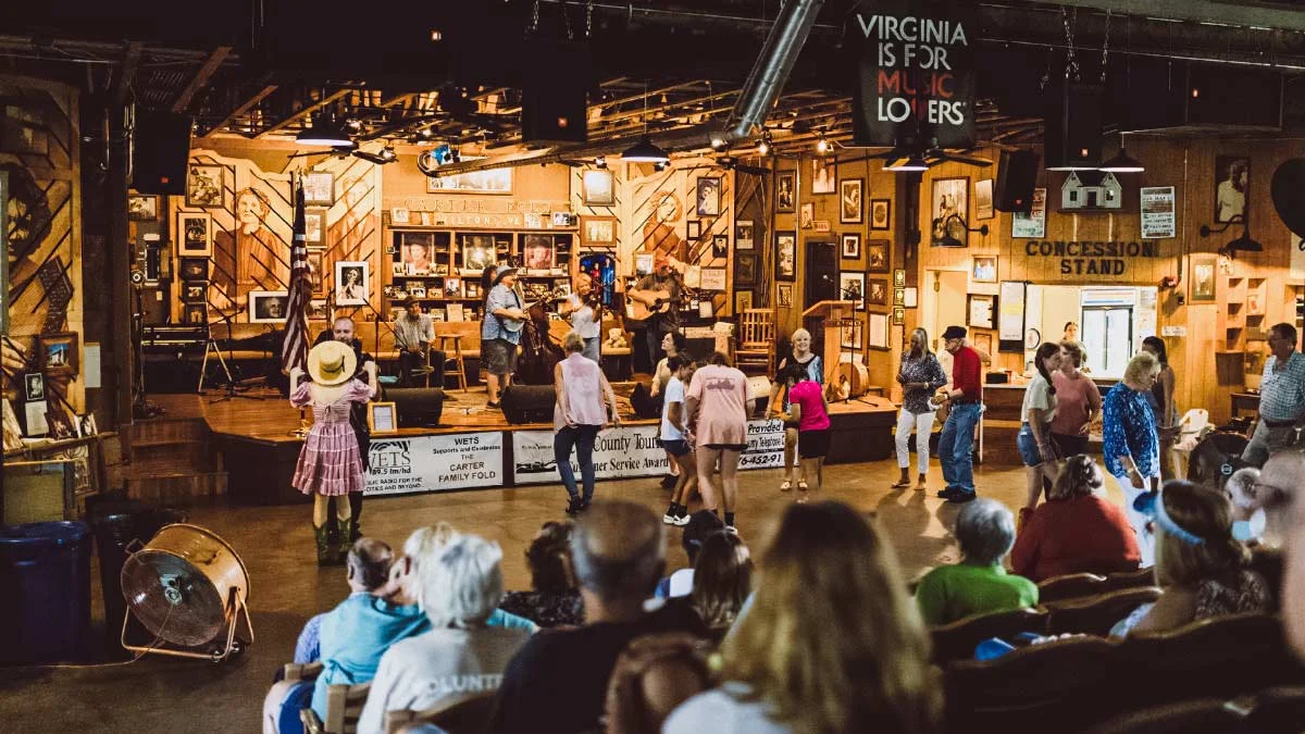 Crowd flatfoot dancing to live music at the Carter Fold in Hiltons, Scott County