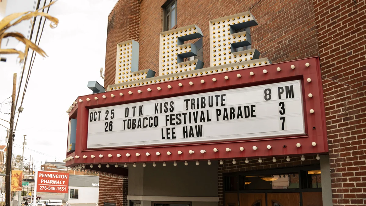 The Lee Theatre marquee lists upcoming events on the brick storefront in Pennington Gap, Virginia.